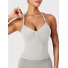 imageYEOREO SoftHue Impact Longline Strappy Top Womens Halter Workout Tank Tops Backless Gym Longline with Adjustable StrapFeather Rice