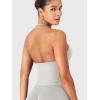 imageYEOREO SoftHue Impact Longline Strappy Top Womens Halter Workout Tank Tops Backless Gym Longline with Adjustable StrapFeather Rice