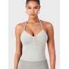 imageYEOREO SoftHue Impact Longline Strappy Top Womens Halter Workout Tank Tops Backless Gym Longline with Adjustable StrapFeather Rice