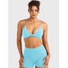 imageYEOREO Women Sports Bra Jocelyna Sliding Back Straps Twist Front Criss Cross Light Support Strappy Padd Workout BraletteLight Blue