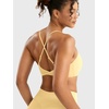 image:imageYEOREO CoreFlex Sports Bras for Women Workout Twist Cross Back Padded Adjustable Spaghetti Straps Gym Yoga TopsMilk Yellow
