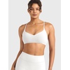 image:imageYEOREO CoreFlex Sports Bras for Women Workout Twist Cross Back Padded Adjustable Spaghetti Straps Gym Yoga TopsWhite