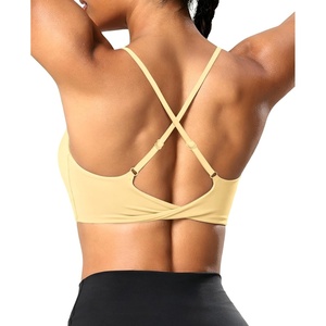 image:imageYEOREO CoreFlex Sports Bras for Women Workout Twist Cross Back Padded Adjustable Spaghetti Straps Gym Yoga TopsMilk Yellow