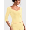 image:imageYEOREO Ease Womens 34 Sleeve Tops Workout Yoga Shirts  Double Lined Scoop Neck Slim Fit Soft Breathable Gym RunningCreamy Yellow